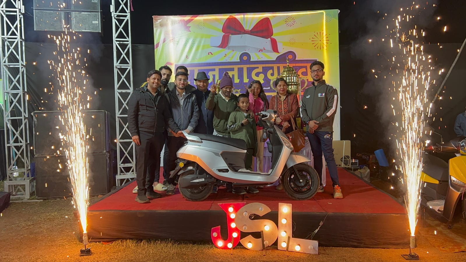 A FaydaBazaar prize celebration with an electric scooter